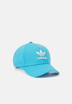 Grüne adidas Caps für deinen lässigen Look online entdecken